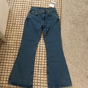 Ragged priest jeans
